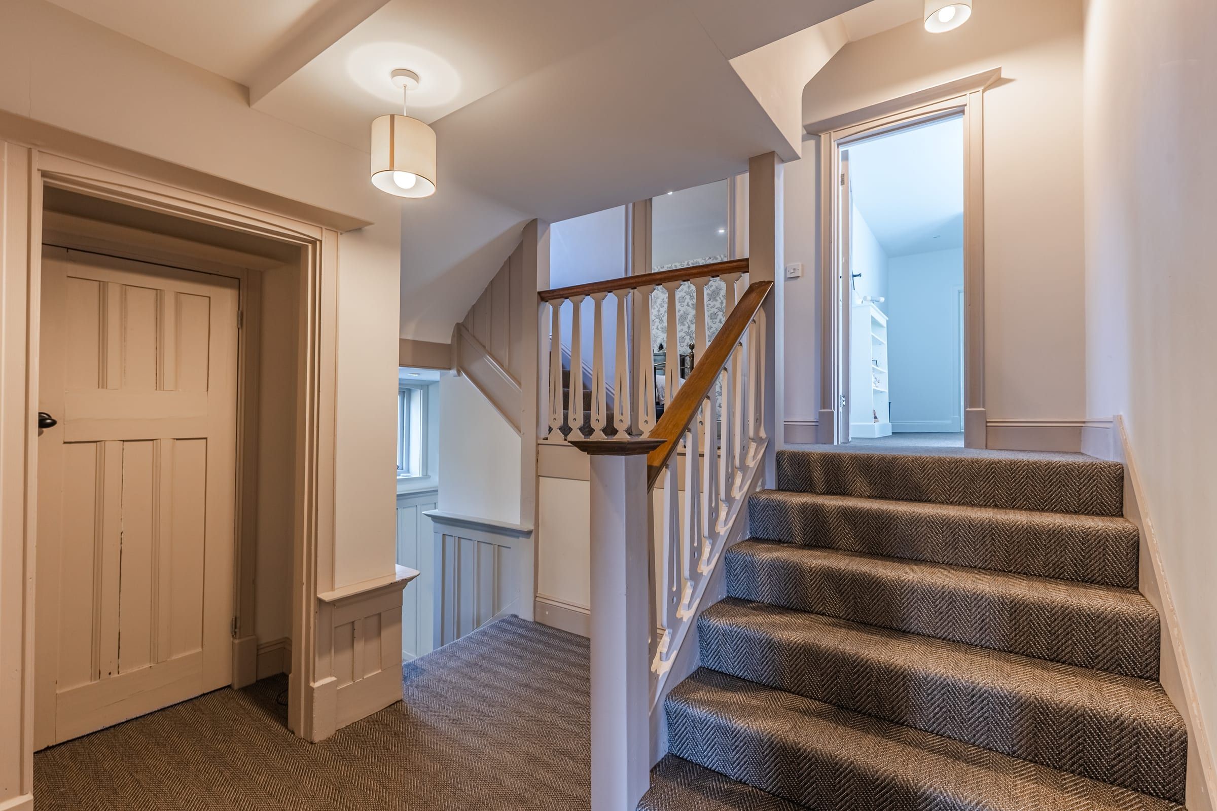 The staircase with herringbone flooring