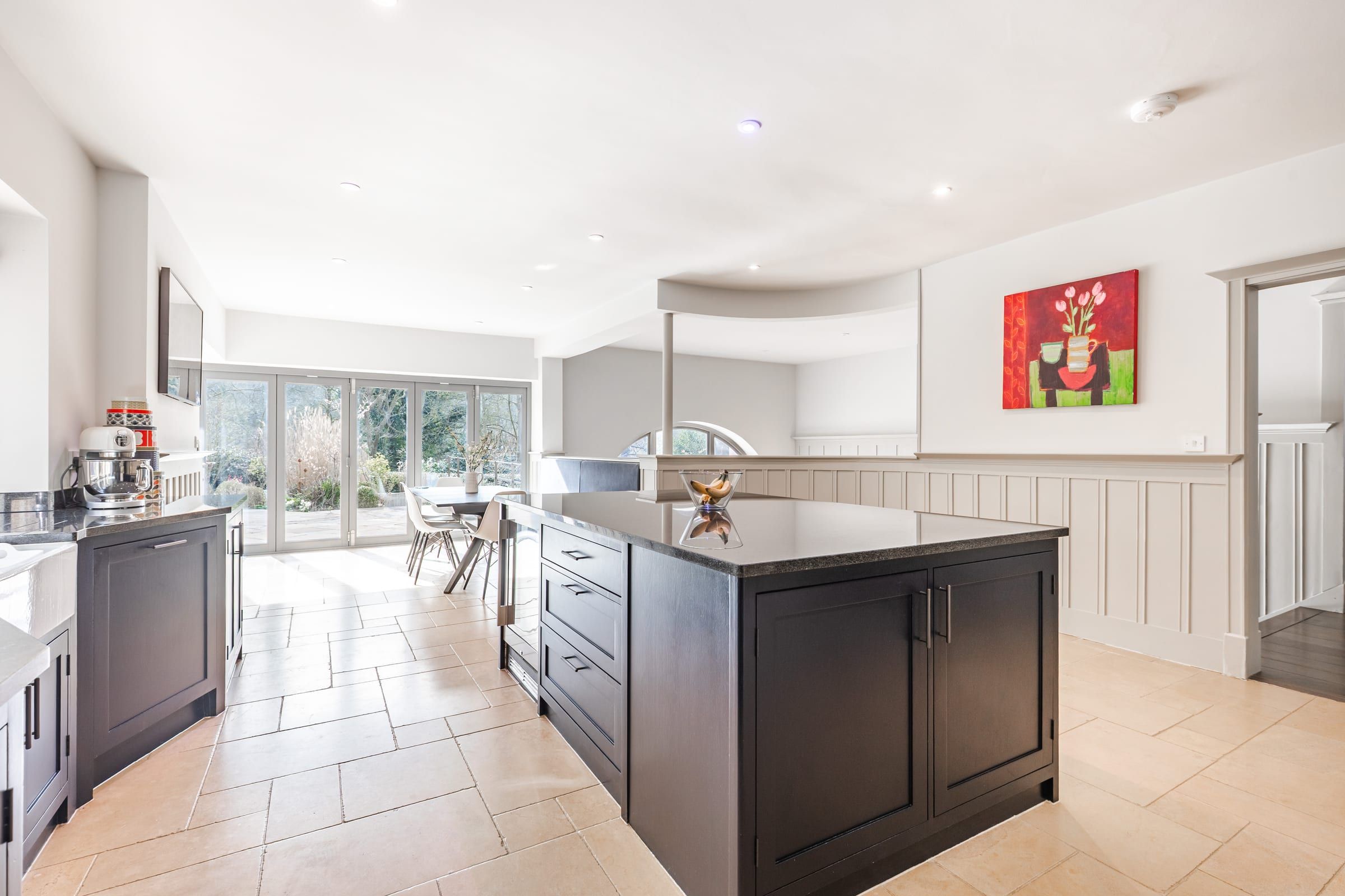 The bespoke kitchen with Everhot range and central island