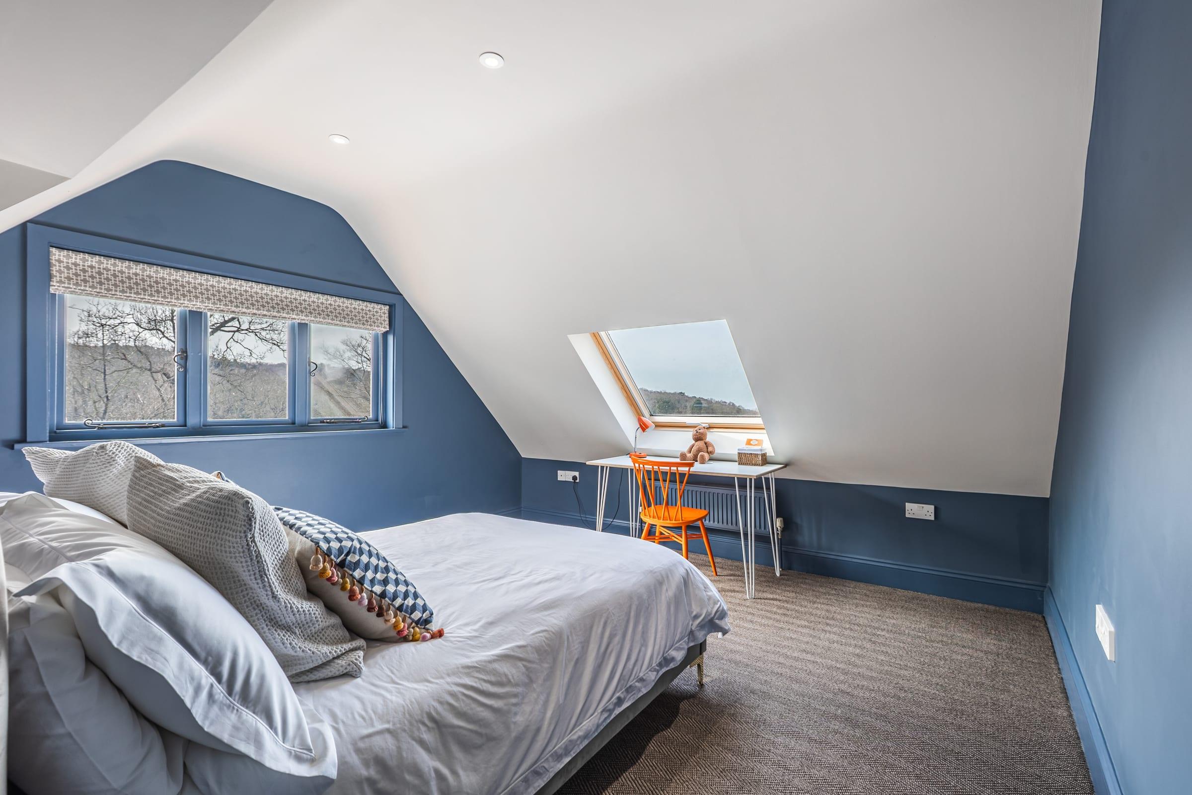 Wake beneath the skylight to a vaulted ceiling and open sky